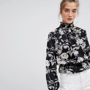 Parisian high neck black and white floral long-sleeve blouse